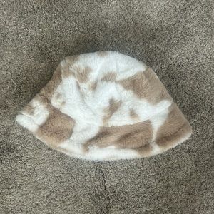 Fuzzy cow print bucket hat